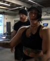 Rhea_Ripley_flexes_on_Sheamus_with_her__Nightmare__Arms_workout_4532.jpg