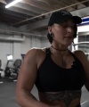 Rhea_Ripley_flexes_on_Sheamus_with_her__Nightmare__Arms_workout_4551.jpg