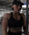 Rhea_Ripley_flexes_on_Sheamus_with_her__Nightmare__Arms_workout_4556.jpg