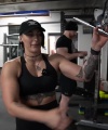 Rhea_Ripley_flexes_on_Sheamus_with_her__Nightmare__Arms_workout_4582.jpg