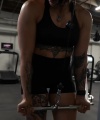 Rhea_Ripley_flexes_on_Sheamus_with_her__Nightmare__Arms_workout_4621.jpg