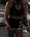 Rhea_Ripley_flexes_on_Sheamus_with_her__Nightmare__Arms_workout_4622.jpg