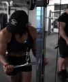 Rhea_Ripley_flexes_on_Sheamus_with_her__Nightmare__Arms_workout_4679.jpg