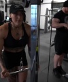 Rhea_Ripley_flexes_on_Sheamus_with_her__Nightmare__Arms_workout_4683.jpg
