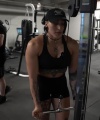 Rhea_Ripley_flexes_on_Sheamus_with_her__Nightmare__Arms_workout_4705.jpg