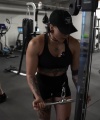 Rhea_Ripley_flexes_on_Sheamus_with_her__Nightmare__Arms_workout_4706.jpg