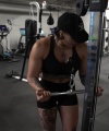 Rhea_Ripley_flexes_on_Sheamus_with_her__Nightmare__Arms_workout_4707.jpg