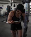 Rhea_Ripley_flexes_on_Sheamus_with_her__Nightmare__Arms_workout_4708.jpg