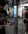 Rhea_Ripley_flexes_on_Sheamus_with_her__Nightmare__Arms_workout_4727.jpg
