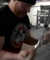Rhea_Ripley_flexes_on_Sheamus_with_her__Nightmare__Arms_workout_4733.jpg