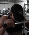Rhea_Ripley_flexes_on_Sheamus_with_her__Nightmare__Arms_workout_4741.jpg