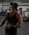 Rhea_Ripley_flexes_on_Sheamus_with_her__Nightmare__Arms_workout_4771.jpg