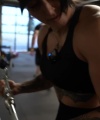 Rhea_Ripley_flexes_on_Sheamus_with_her__Nightmare__Arms_workout_4800.jpg