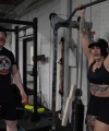 Rhea_Ripley_flexes_on_Sheamus_with_her__Nightmare__Arms_workout_4951.jpg