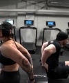 Rhea_Ripley_flexes_on_Sheamus_with_her__Nightmare__Arms_workout_5167.jpg