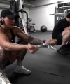Rhea_Ripley_flexes_on_Sheamus_with_her__Nightmare__Arms_workout_5208.jpg