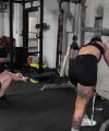 Rhea_Ripley_flexes_on_Sheamus_with_her__Nightmare__Arms_workout_5239.jpg