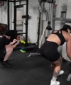 Rhea_Ripley_flexes_on_Sheamus_with_her__Nightmare__Arms_workout_5242.jpg