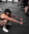 Rhea_Ripley_flexes_on_Sheamus_with_her__Nightmare__Arms_workout_5251.jpg