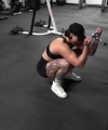 Rhea_Ripley_flexes_on_Sheamus_with_her__Nightmare__Arms_workout_5254.jpg