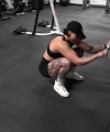 Rhea_Ripley_flexes_on_Sheamus_with_her__Nightmare__Arms_workout_5255.jpg