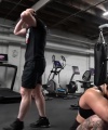 Rhea_Ripley_flexes_on_Sheamus_with_her__Nightmare__Arms_workout_5280.jpg