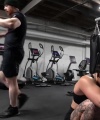 Rhea_Ripley_flexes_on_Sheamus_with_her__Nightmare__Arms_workout_5281.jpg