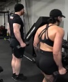 Rhea_Ripley_flexes_on_Sheamus_with_her__Nightmare__Arms_workout_5288.jpg
