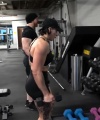 Rhea_Ripley_flexes_on_Sheamus_with_her__Nightmare__Arms_workout_5291.jpg