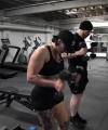 Rhea_Ripley_flexes_on_Sheamus_with_her__Nightmare__Arms_workout_5300.jpg