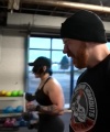 Rhea_Ripley_flexes_on_Sheamus_with_her__Nightmare__Arms_workout_5315.jpg