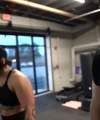 Rhea_Ripley_flexes_on_Sheamus_with_her__Nightmare__Arms_workout_5318.jpg