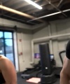 Rhea_Ripley_flexes_on_Sheamus_with_her__Nightmare__Arms_workout_5319.jpg
