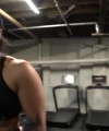 Rhea_Ripley_flexes_on_Sheamus_with_her__Nightmare__Arms_workout_5324.jpg