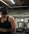 Rhea_Ripley_flexes_on_Sheamus_with_her__Nightmare__Arms_workout_5327.jpg