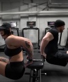 Rhea_Ripley_flexes_on_Sheamus_with_her__Nightmare__Arms_workout_5408.jpg