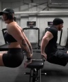 Rhea_Ripley_flexes_on_Sheamus_with_her__Nightmare__Arms_workout_5409.jpg