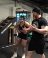 Rhea_Ripley_flexes_on_Sheamus_with_her__Nightmare__Arms_workout_5445.jpg