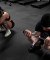 Rhea_Ripley_flexes_on_Sheamus_with_her__Nightmare__Arms_workout_5463.jpg