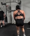 Rhea_Ripley_flexes_on_Sheamus_with_her__Nightmare__Arms_workout_5520.jpg
