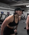 Rhea_Ripley_flexes_on_Sheamus_with_her__Nightmare__Arms_workout_5530.jpg