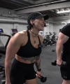 Rhea_Ripley_flexes_on_Sheamus_with_her__Nightmare__Arms_workout_5533.jpg