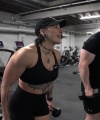 Rhea_Ripley_flexes_on_Sheamus_with_her__Nightmare__Arms_workout_5534.jpg