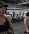 Rhea_Ripley_flexes_on_Sheamus_with_her__Nightmare__Arms_workout_5548.jpg