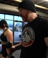 Rhea_Ripley_flexes_on_Sheamus_with_her__Nightmare__Arms_workout_5557.jpg