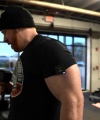 Rhea_Ripley_flexes_on_Sheamus_with_her__Nightmare__Arms_workout_5564.jpg
