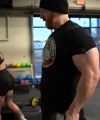 Rhea_Ripley_flexes_on_Sheamus_with_her__Nightmare__Arms_workout_5566.jpg
