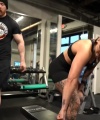 Rhea_Ripley_flexes_on_Sheamus_with_her__Nightmare__Arms_workout_5583.jpg