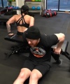 Rhea_Ripley_flexes_on_Sheamus_with_her__Nightmare__Arms_workout_5600.jpg