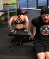 Rhea_Ripley_flexes_on_Sheamus_with_her__Nightmare__Arms_workout_5605.jpg